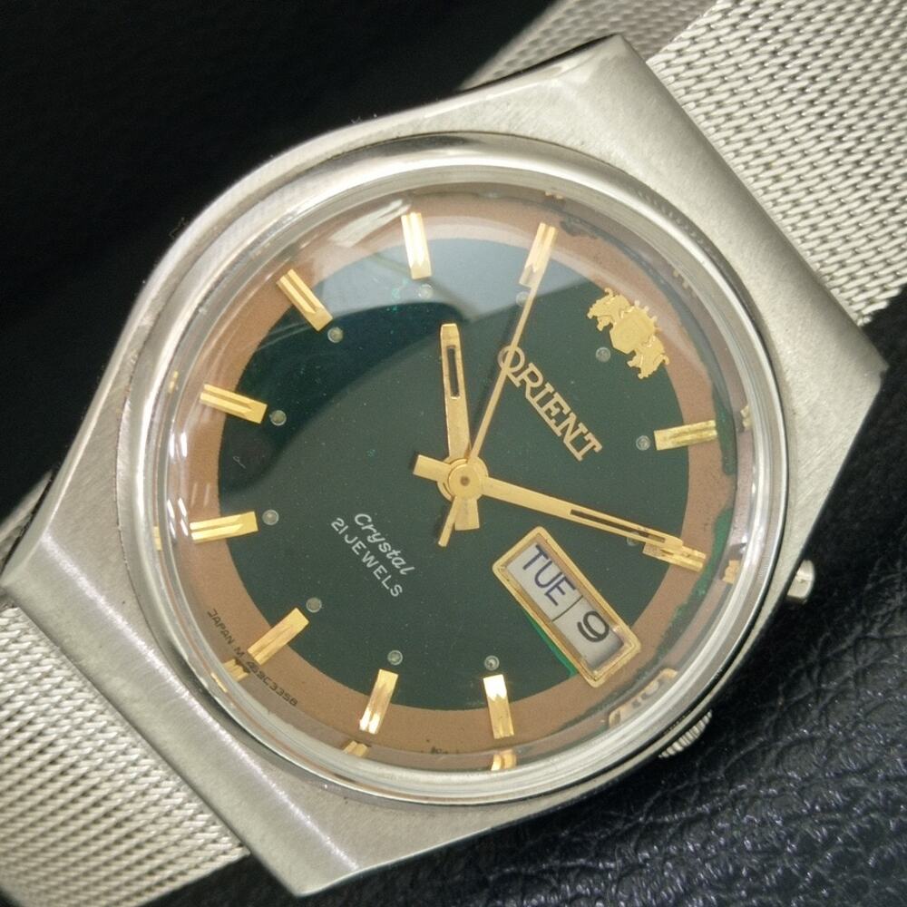 Vintage 1975 Orient Automatic Mens Silver Watch W/daydate & Gold accents